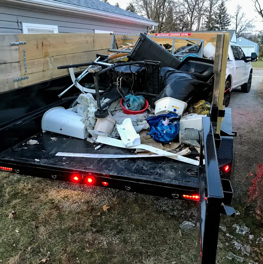 Roll-off dumpster delivered to a residential driveway in Winona Lake