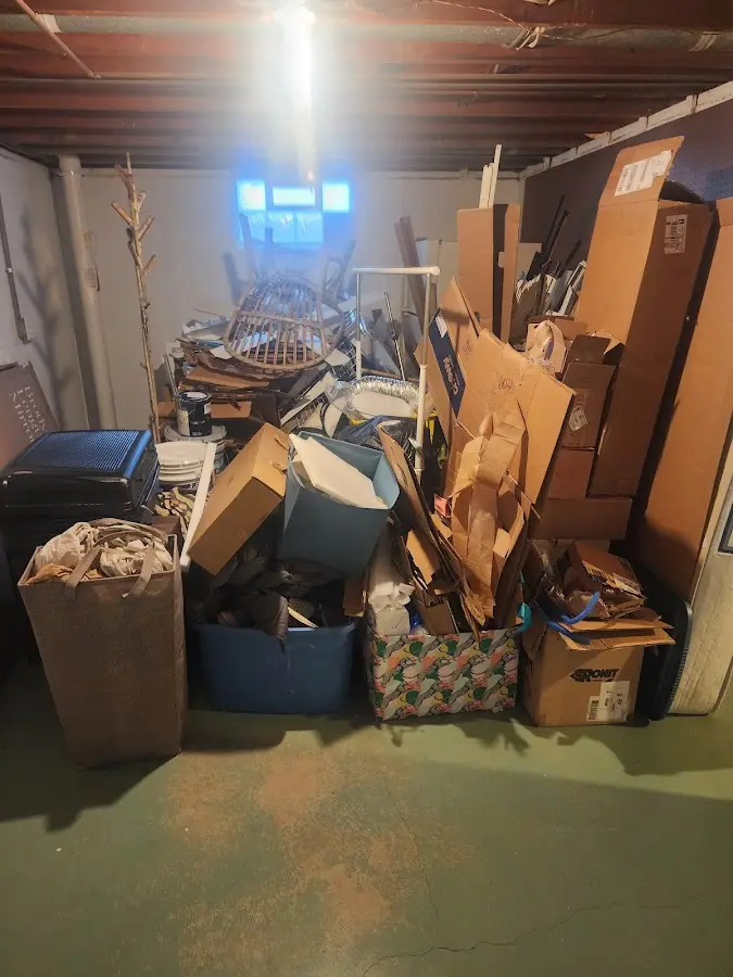 Roll-off dumpster container at job site for 20 Yard Dumpster Rental in Winona Lake